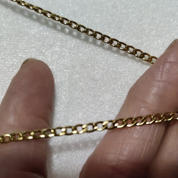 This necklace of the Virgin Mary is multi color and gold the chain is 23 inches - Picture 4 of 7